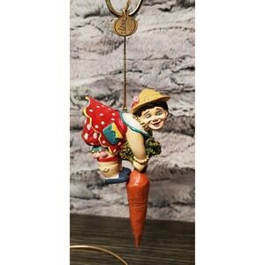 Katherine's Collection Full Figured Gardner Woman Pulling A Carrot 5" Kitschy
